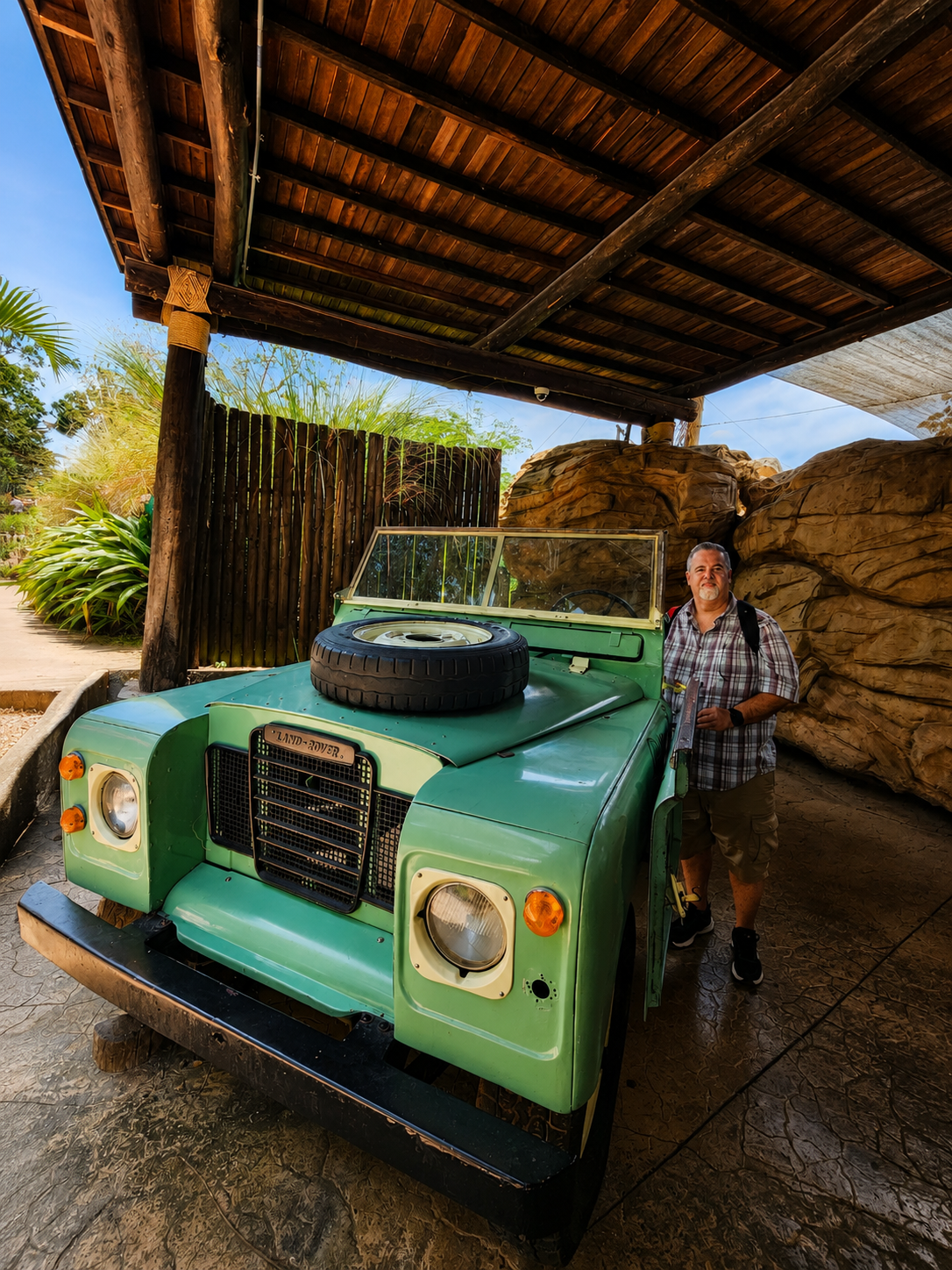 Author with a vintage Land Rover in Colombia